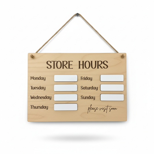 Sign hanging by twine on white background