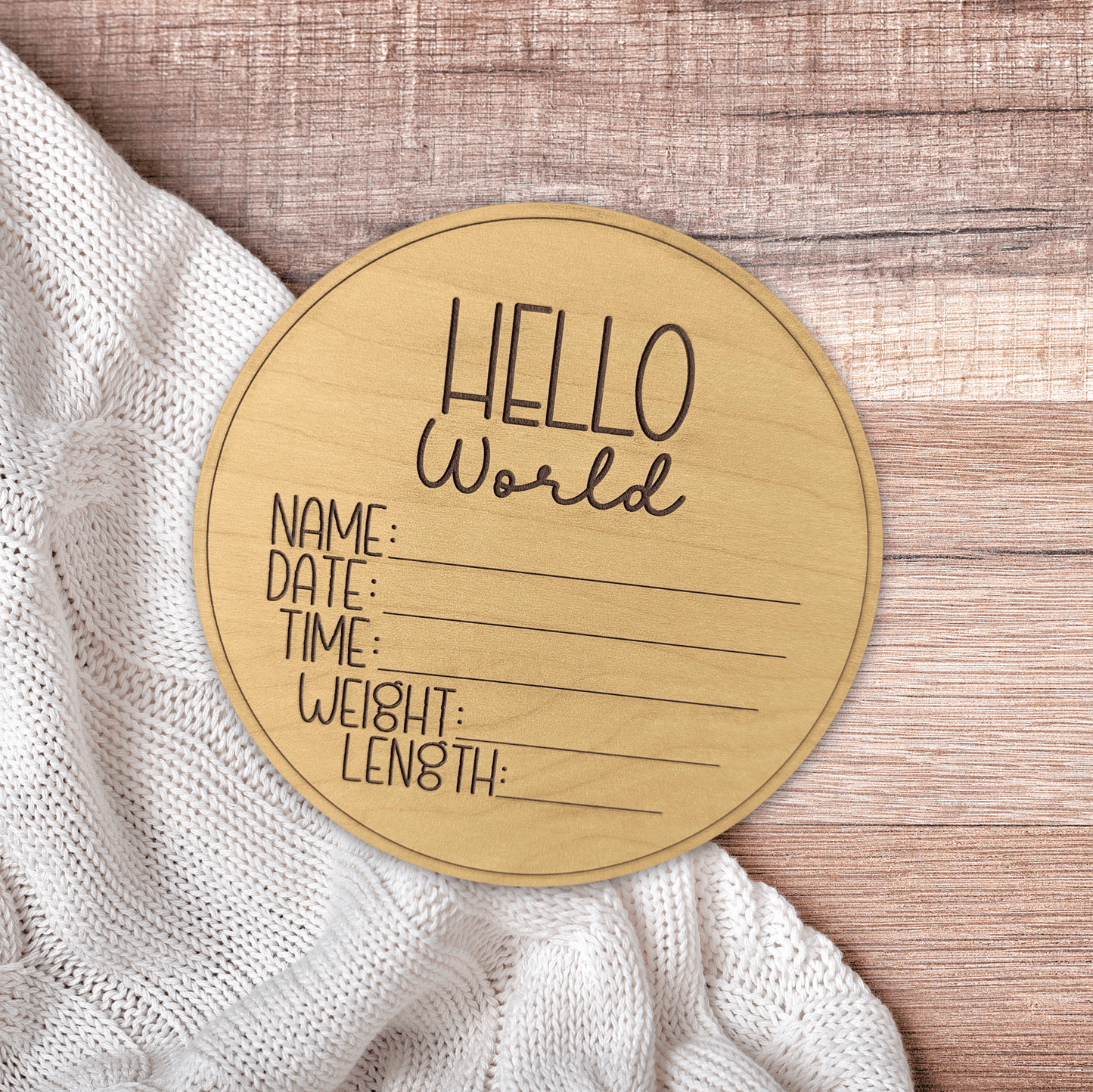 Hello world baby birth announcement disc with area for filling in birth details