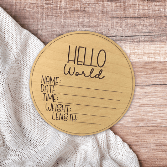 Hello world baby birth announcement disc with area for filling in birth details