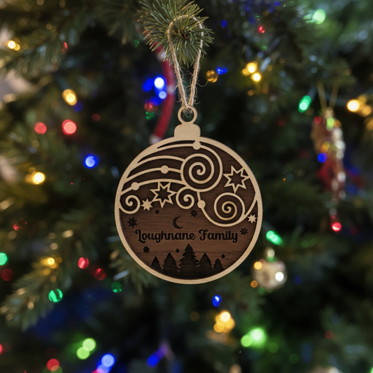 Family Christmas Ornament Hanging on Tree